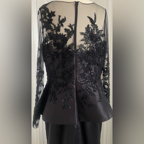 Terani Couture Embroidered Long Sleeve Front Slit Ruffled Mermaid Gown.